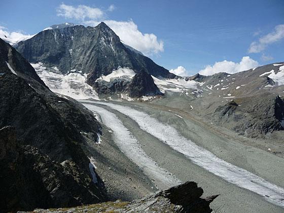 Mont Blanc de Chelion rising above a river of ice flowing down the Val des Dix